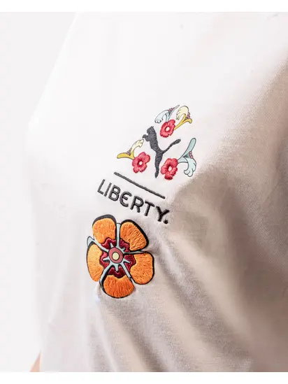 Футболка PUMA X LIBERTY Graphic Tee, молочний