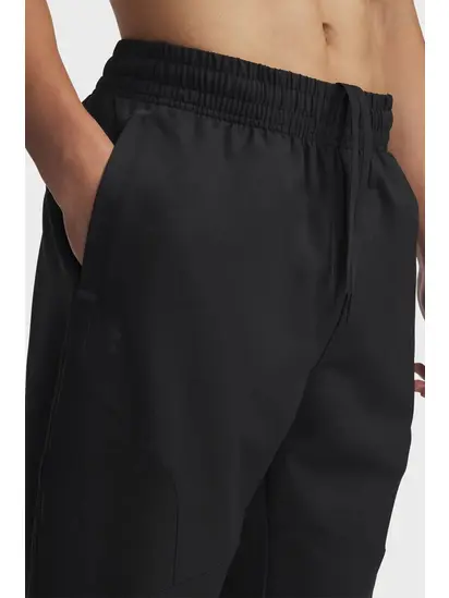 Штани UA Unstoppable Tapered Pants Under Armour M Чорний
