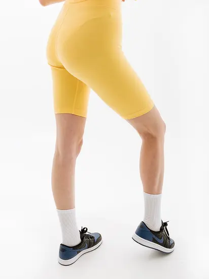 Шорти Nike W NSW ESSNTL MR BIKER SHORT, жовтий