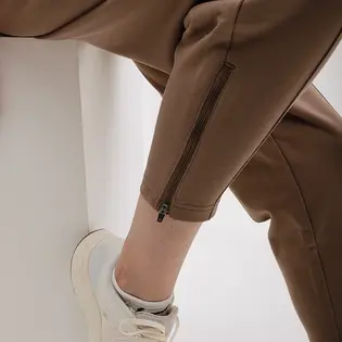 Штани New Balance Athletics Pearl, коричневий