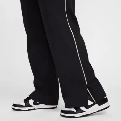 Штани Nike Sportswear Collection женская Mid-Rise Repel Asymmetrical-Waist Trousers