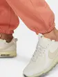 Штани Nike W NSW PANT FLC TREND, кораловий