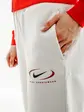 Штани Nike NS PHNX FLC HR OS PANT PRNT, бежевий