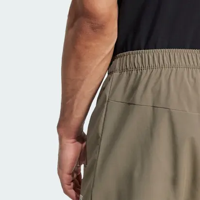 Штани MT ESS PANTS Adidas L Хакі