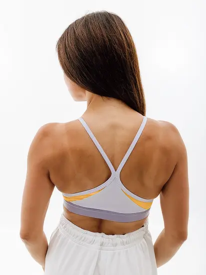 Топ Nike W NK INDY BRA V-NECK, фіолетовий
