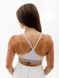 Топ Nike W NK INDY BRA V-NECK, фіолетовий