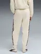 Штани спортивні ESS GRAPHIC Animal Pants Puma L Кремовий