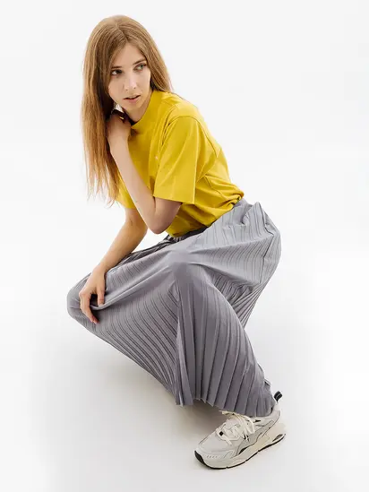 Спідниця Puma YONA SUNP Plissee Skirt, сірий