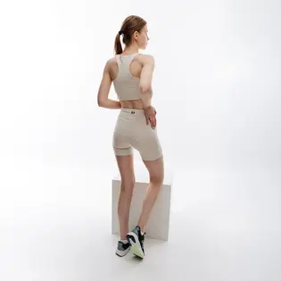 Топ New Balance Essentials Reimagined Bra, бежевий