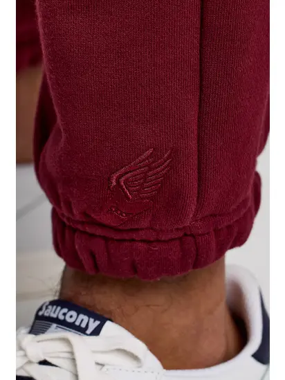 Штани Saucony RECOVERY SWEATPANT, бордовий
