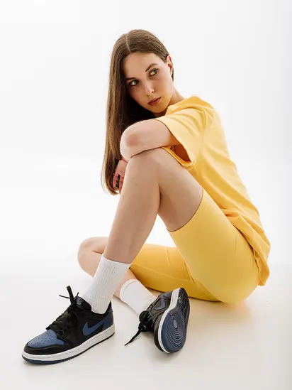 Шорти Nike W NSW ESSNTL MR BIKER SHORT, жовтий